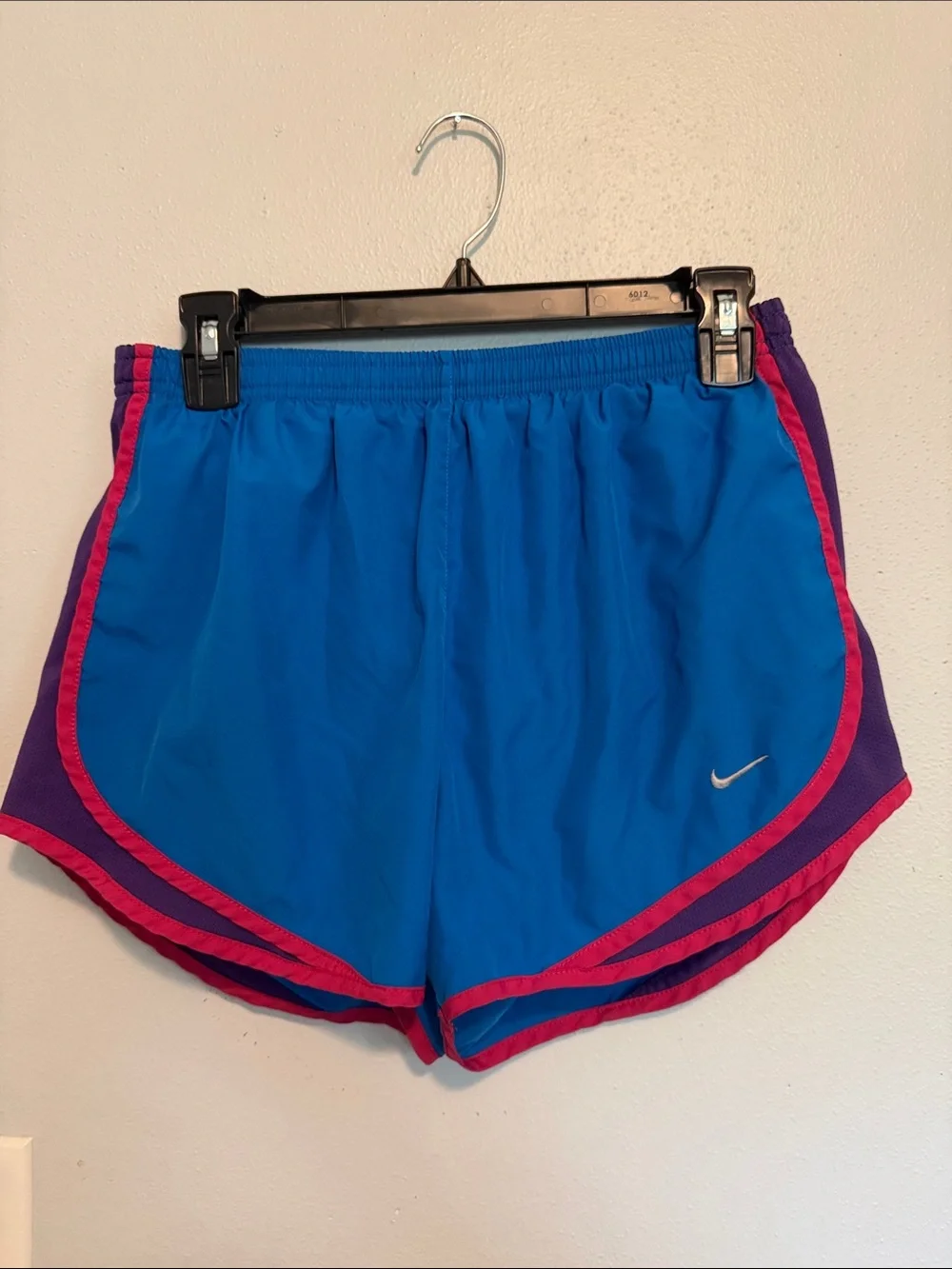Nike Women's Bright Blue Athletic Shorts with Pink and Purple Accents